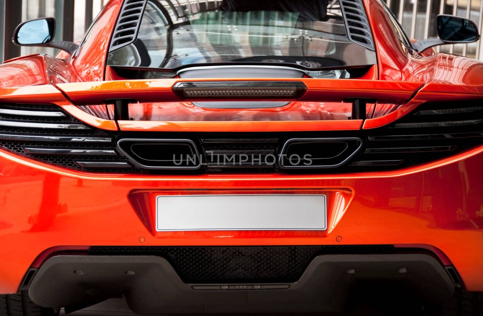 Detail of an orange sports car