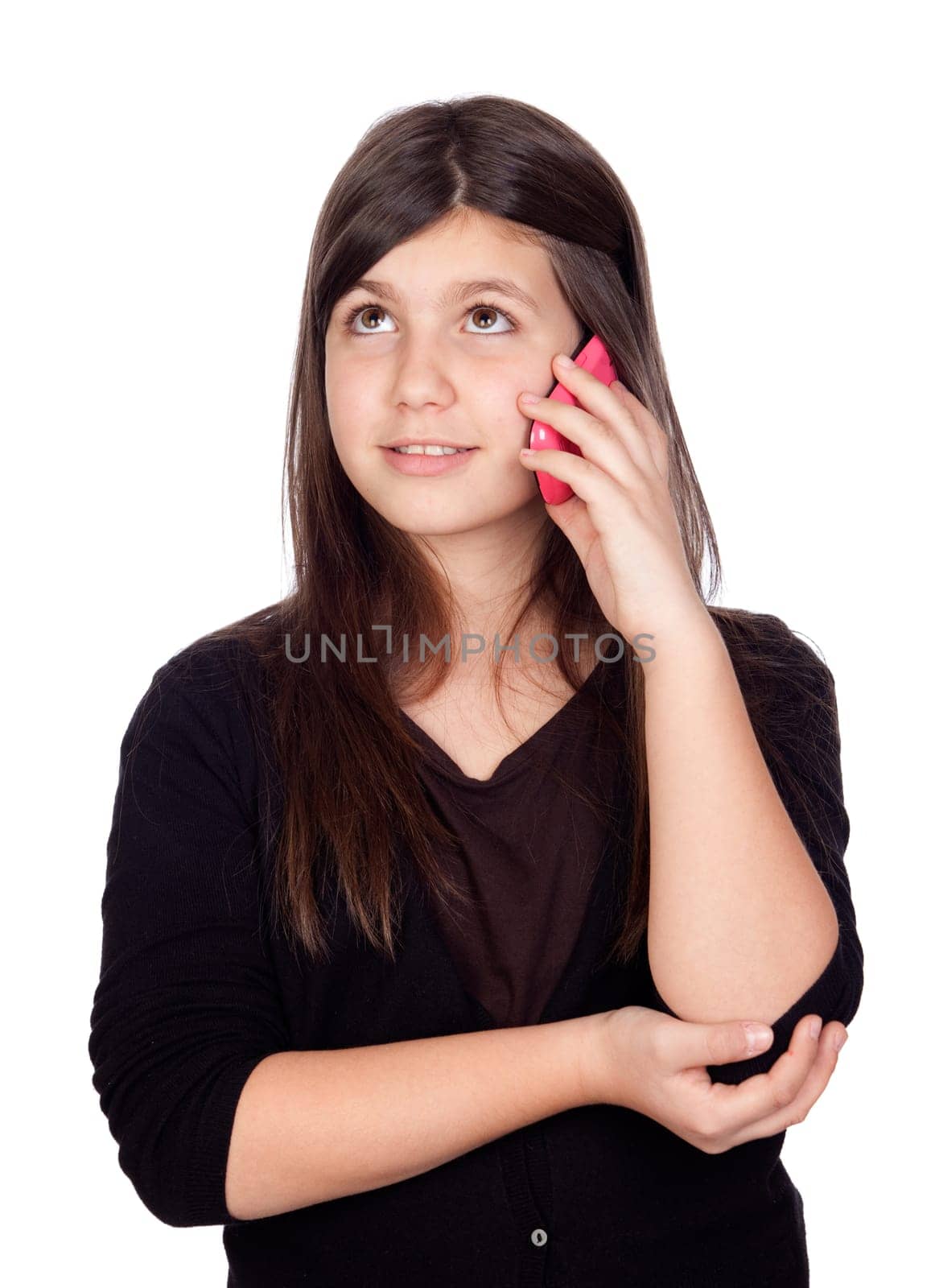 Adorable preteen girl with a mobile isolated on white background