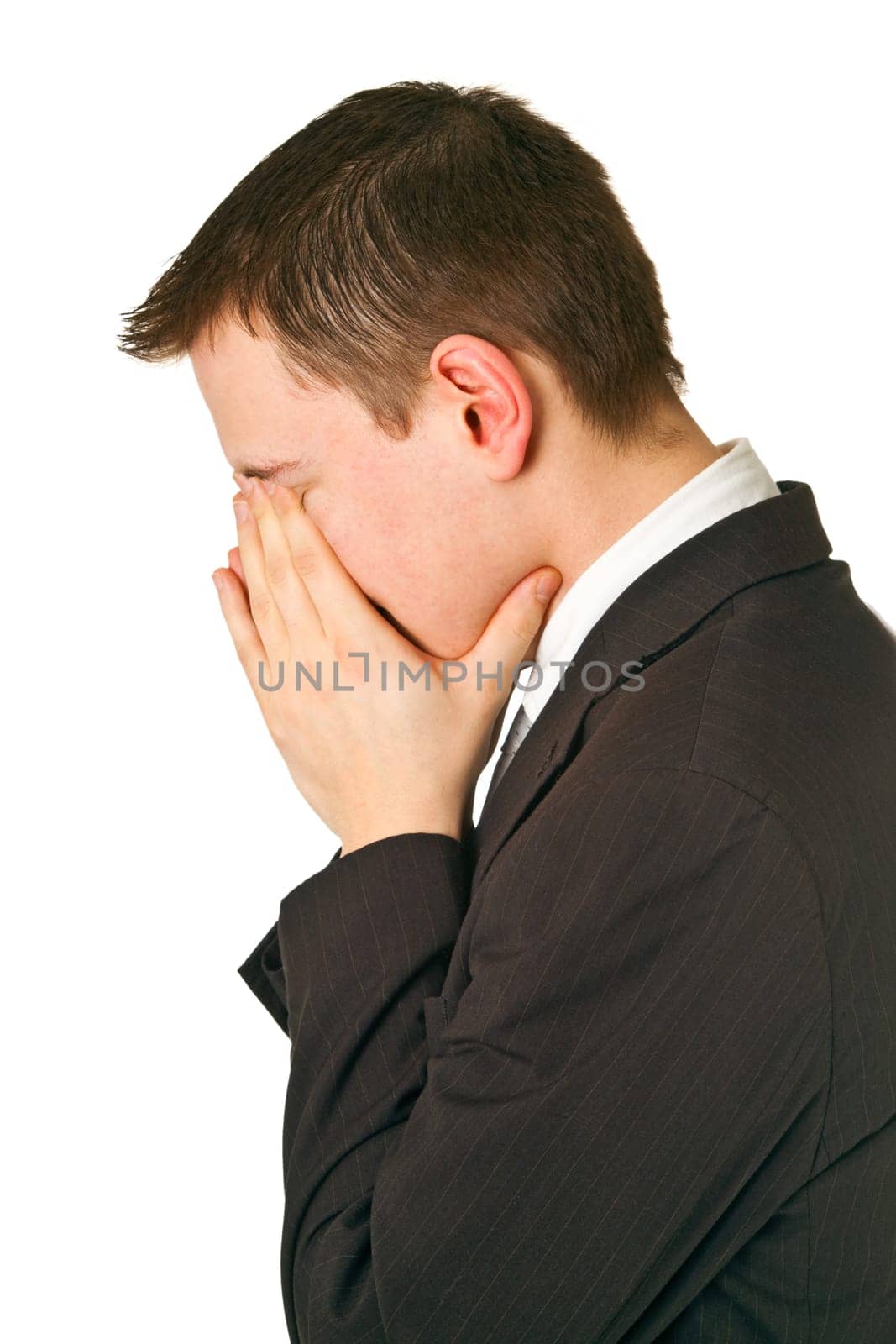 Man holding hands over his face - isolated on white background