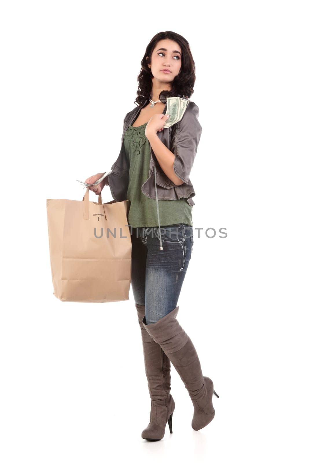 beautiful young teenage woman with shopping bag and cash