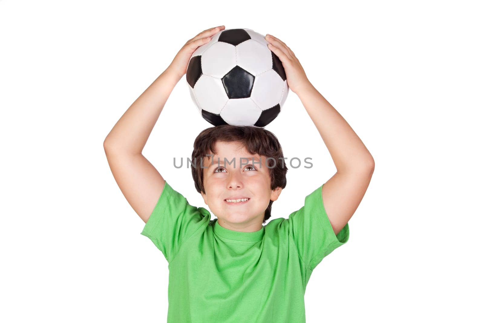 Adorable boy dreaming about being soccer player