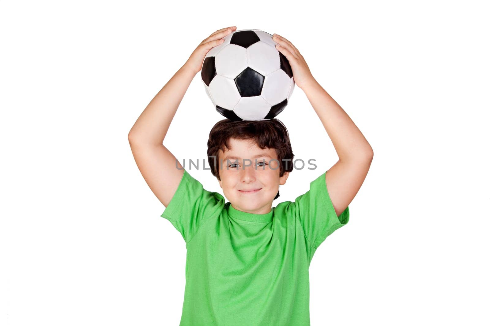 Adorable boy dreaming about being soccer player