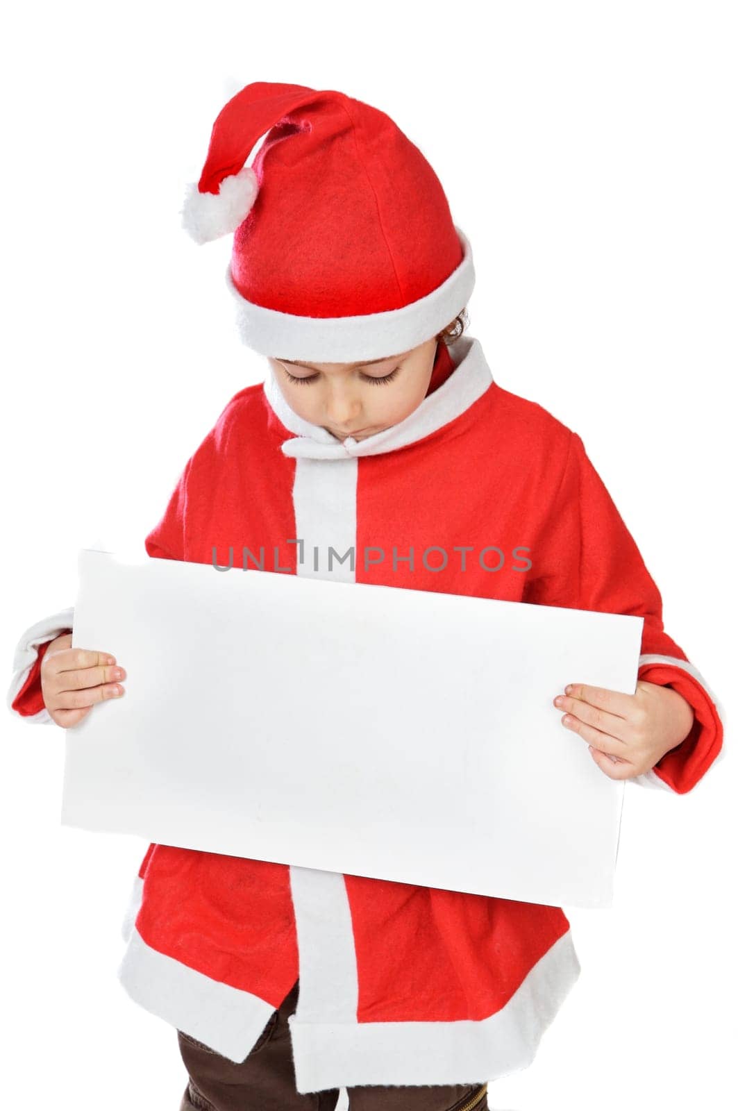 Photo of an adorable boy in christmas with a billboard