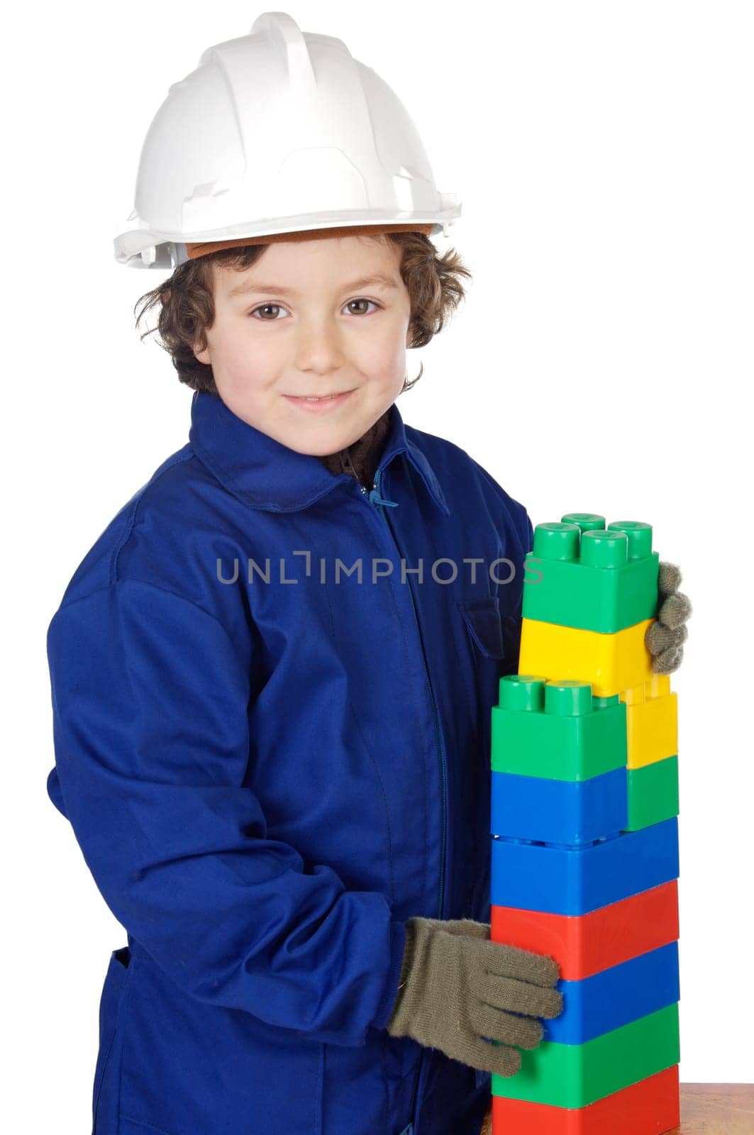 adorable future builder constructing a brick wall with toy pieces a over white background