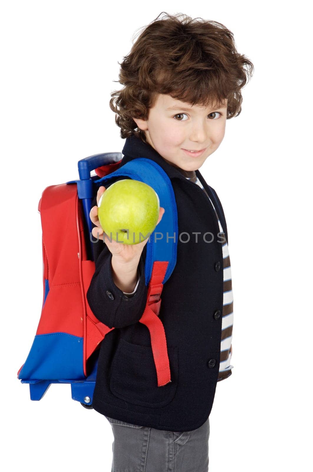 adorable boy student with knapsack and apple a over white background