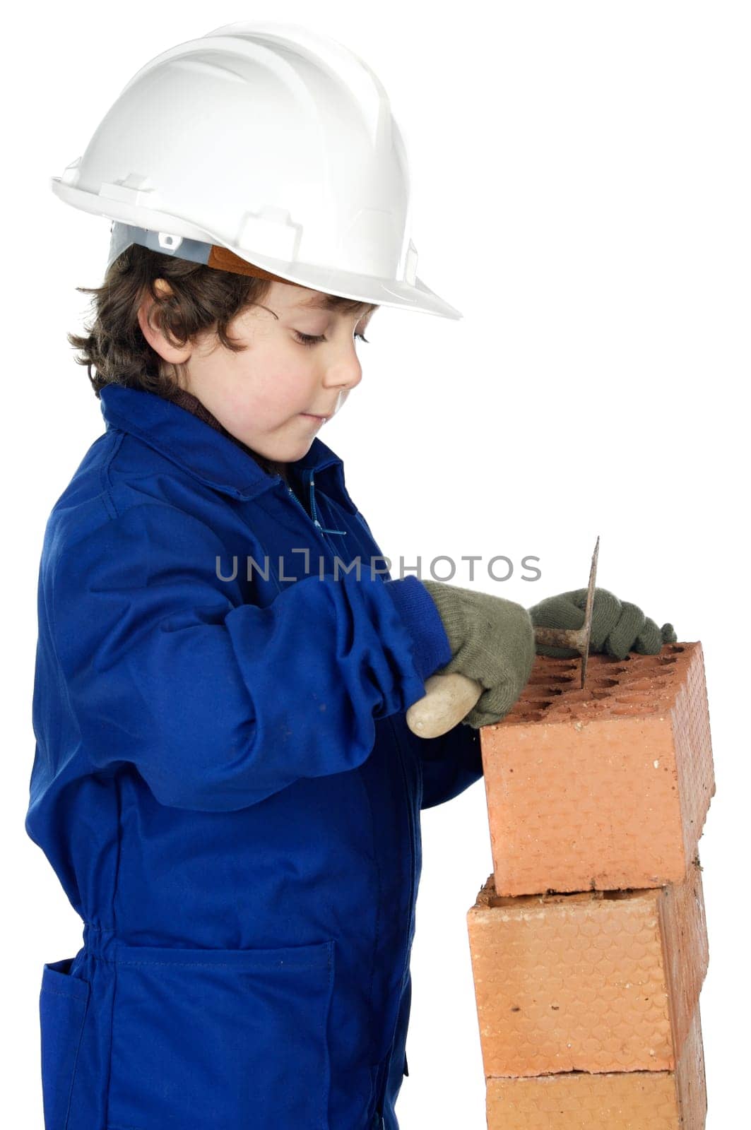 adorable future builder constructing a brick wall a over white background