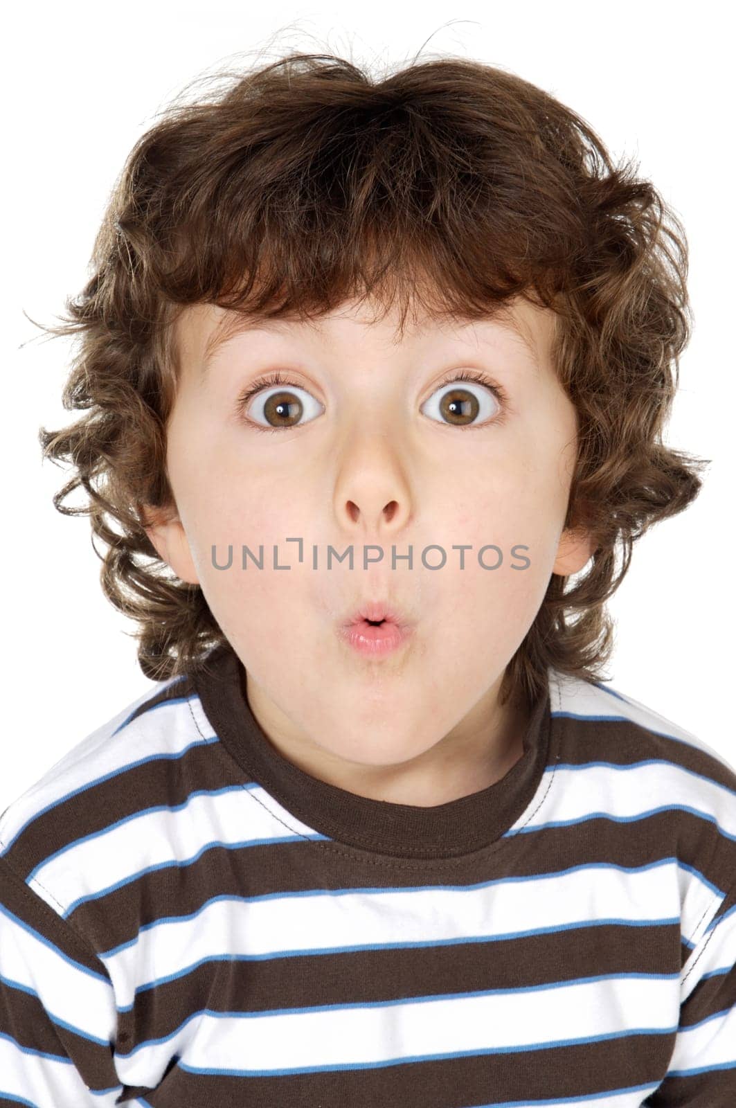 photo of an adorable happy boy making trivialities