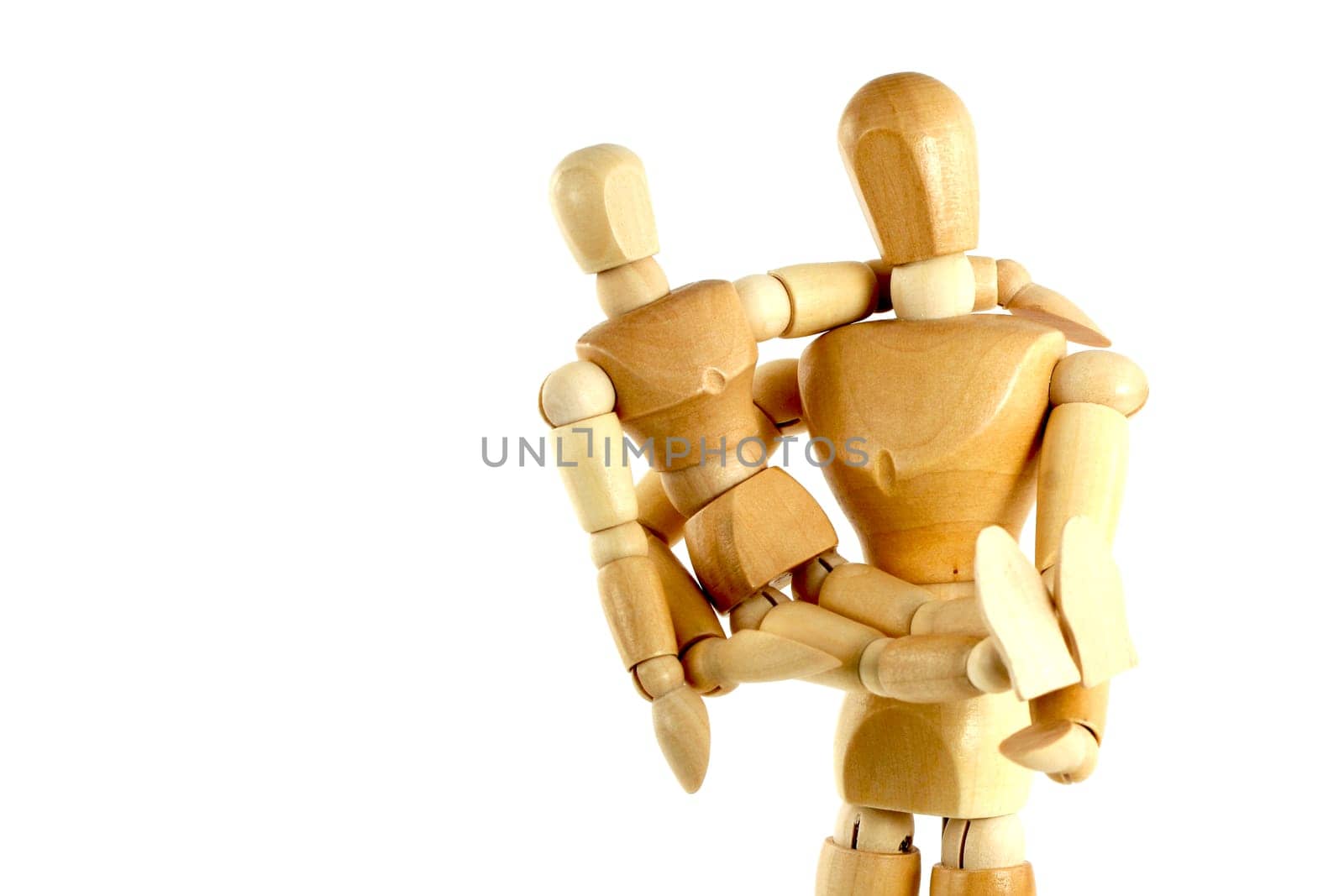 A manikin holding a child
