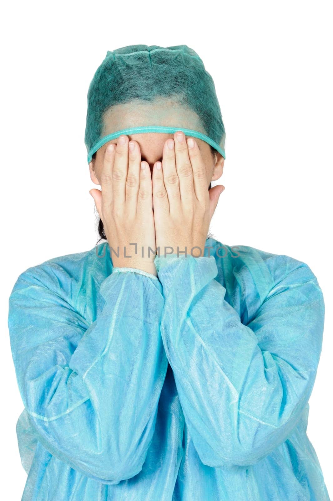 young woman doctor worried with the hands in its face
