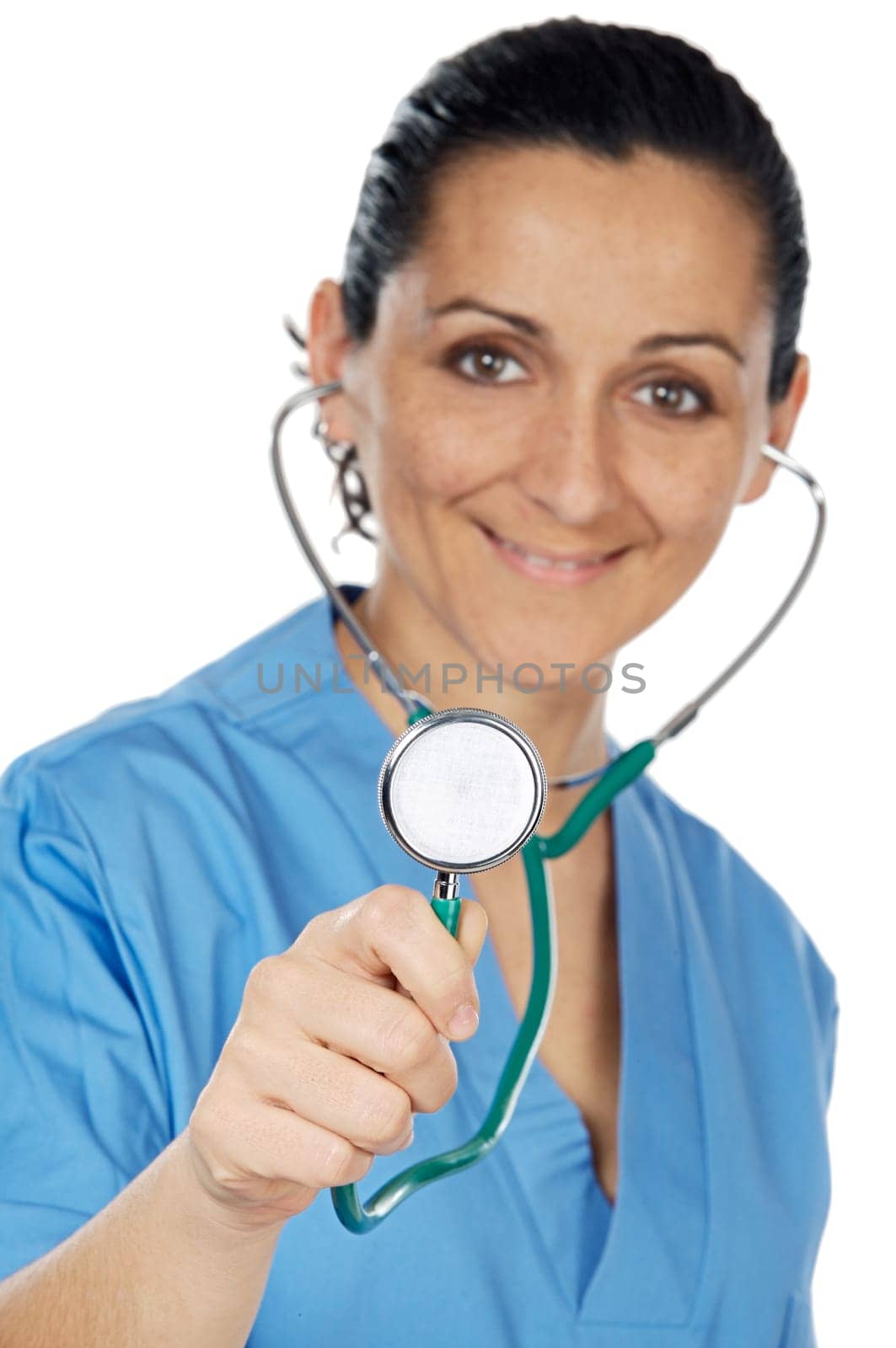 Attractive lady doctor over a white background (focus in the stethoscope)