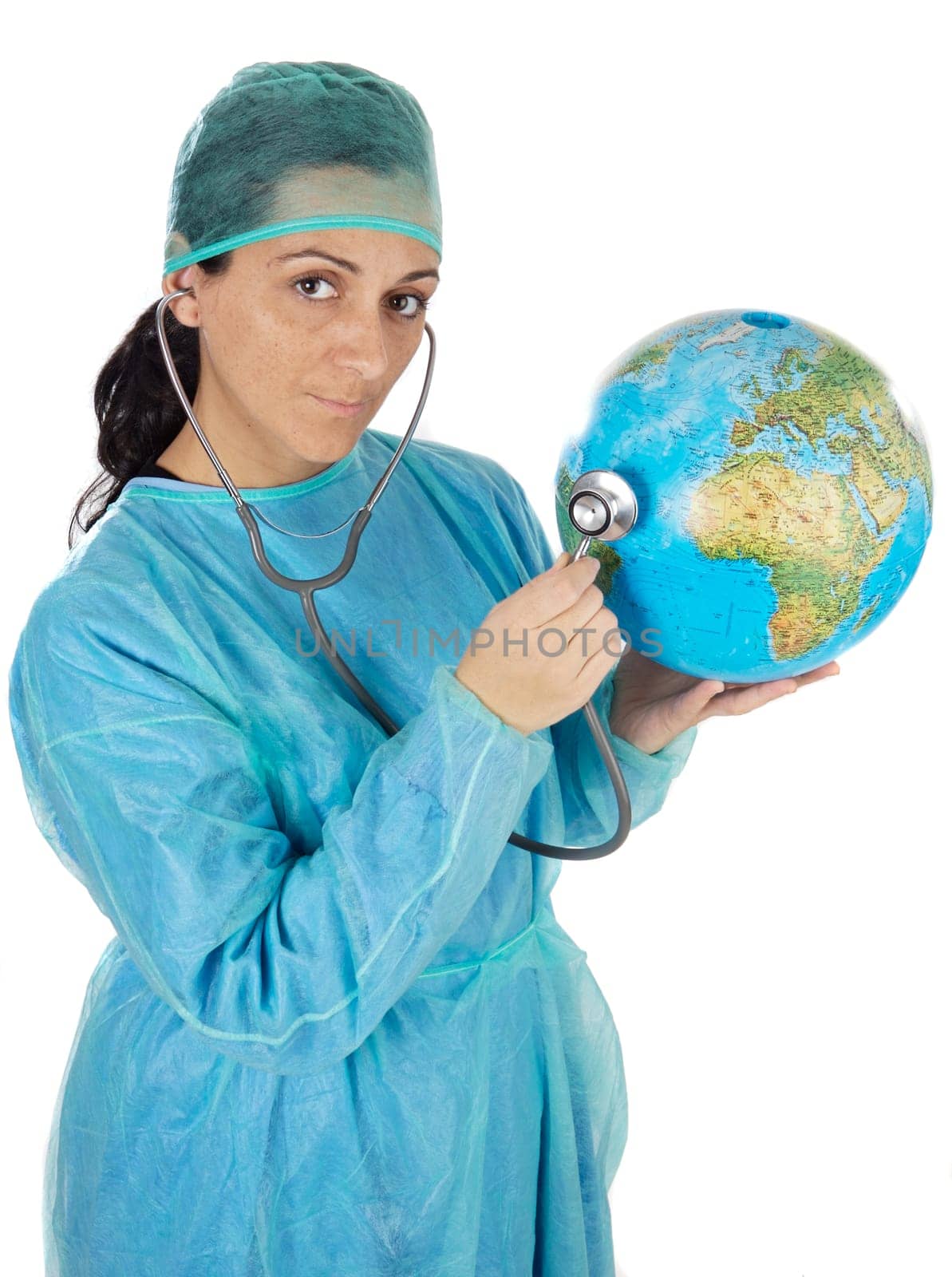 Lady doctor examining the planet earth a over white background