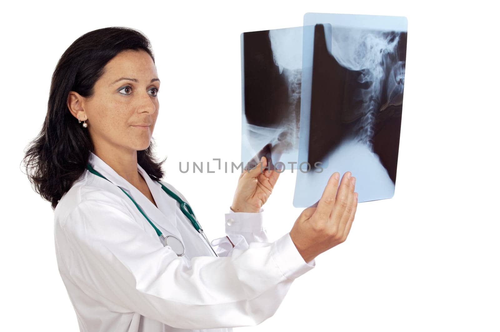 doctor examining a radio graphs a over white background