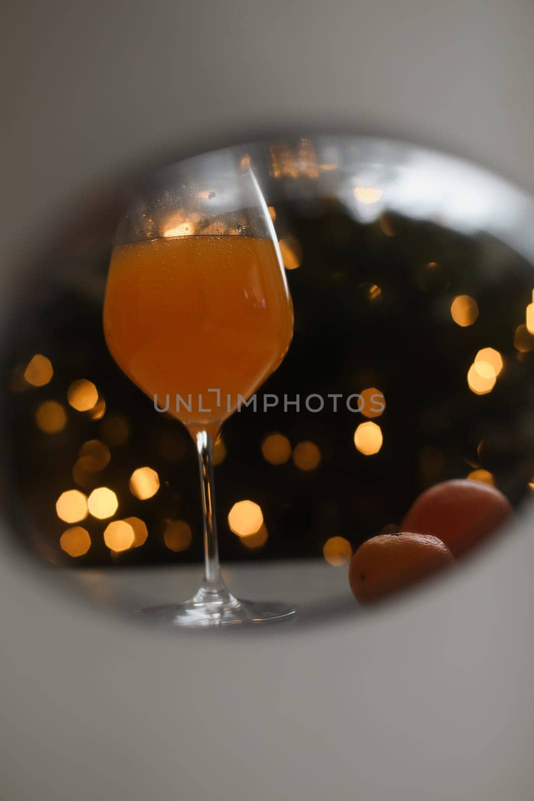 tangerine juice with tangerines on the background of the Christmas. High quality photo