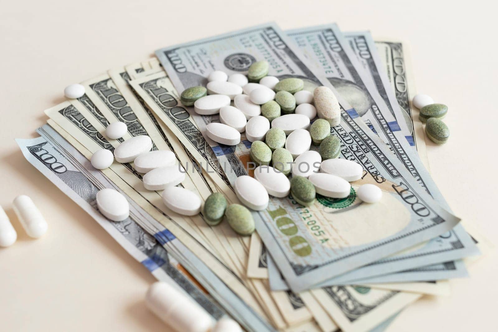 Closeup Many Dollar Money Banknotes And Different Pills Or Tablets. Expensive Medicine And Healthcare Insurances. Inflation. Pharmaceutical Industry And Big Pharma. Horizontal Plane.