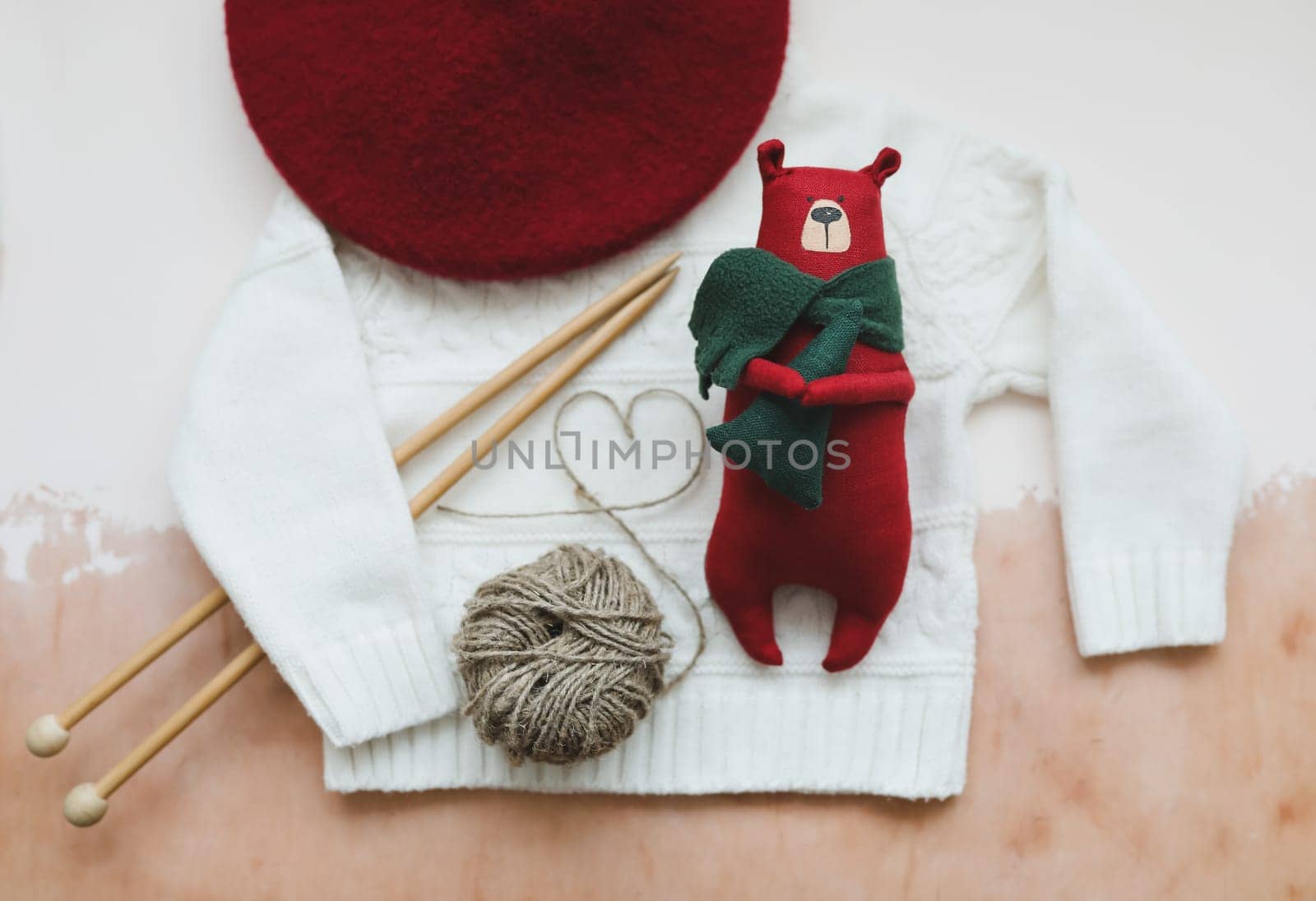 Christmas composition. Toy Teddy Bear, a gift, fir tree branches and decorations. Christmas, winter, new year concept. Flat lay, top view, copy space.