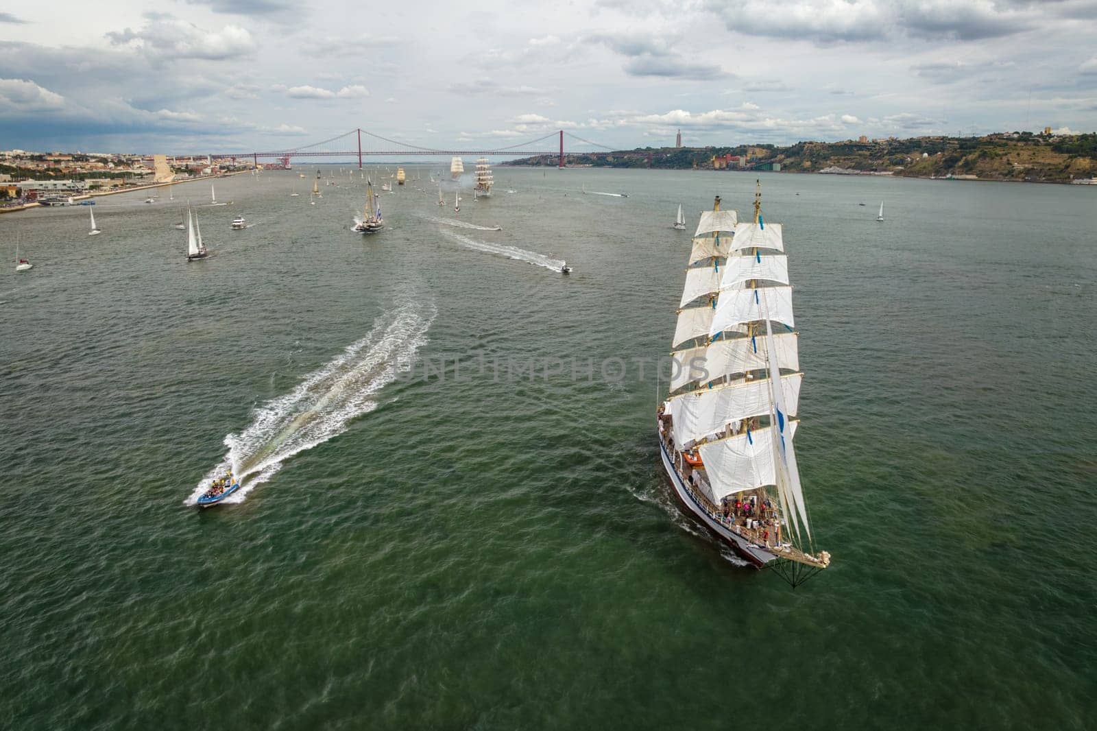 Tall ships sailing in Tagus river. Lisbon, Portugal by dimol