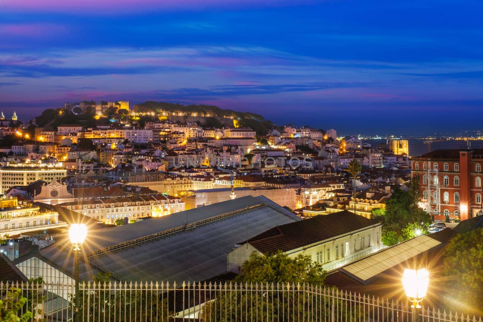 View of Lisbon from Miradouro de Sao Pedro de Alcantara viewpoint. Lisbon, Portugal by dimol