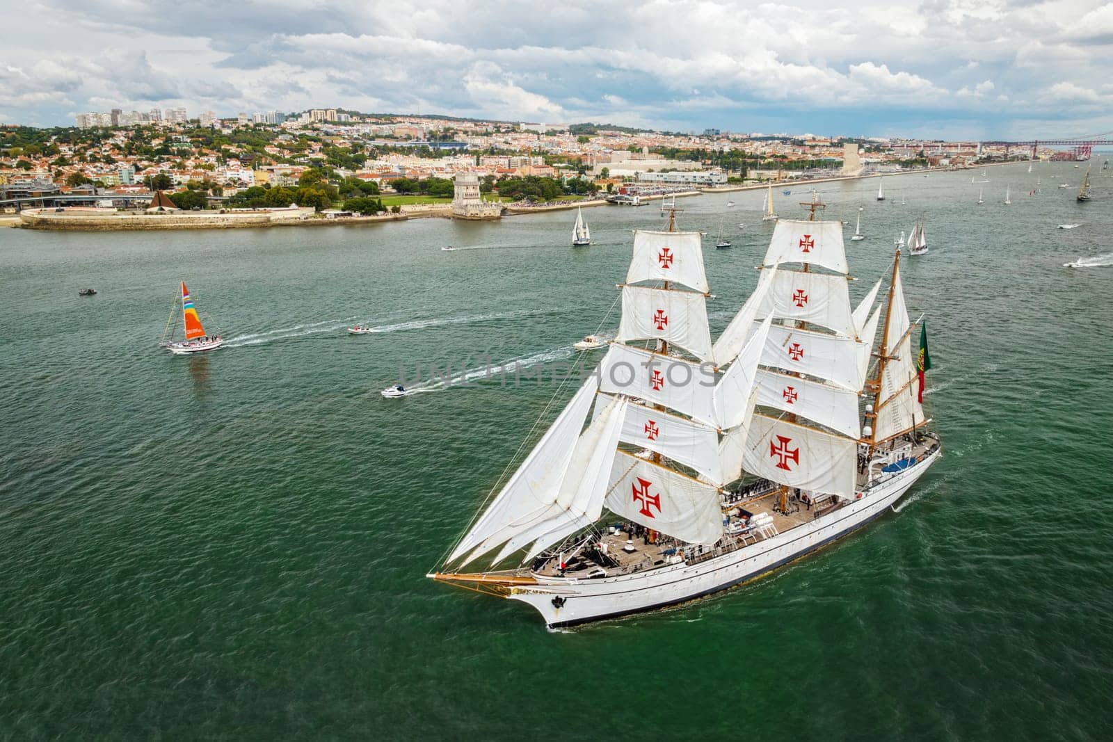 Tall ships sailing in Tagus river. Lisbon, Portugal by dimol