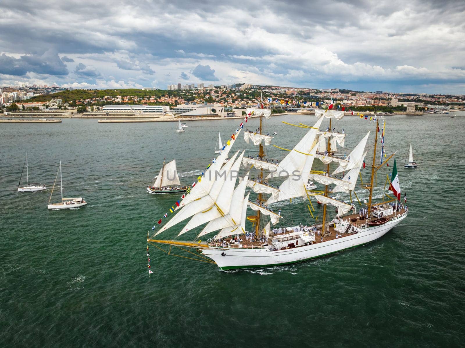 Tall ships sailing in Tagus river. Lisbon, Portugal by dimol