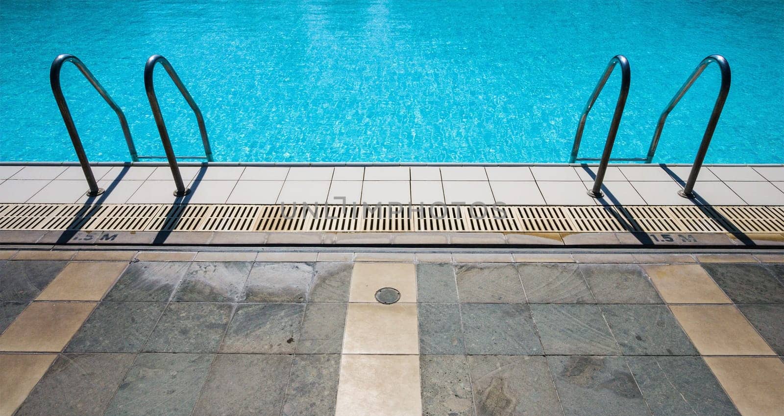 Metal ladder to swimming pool