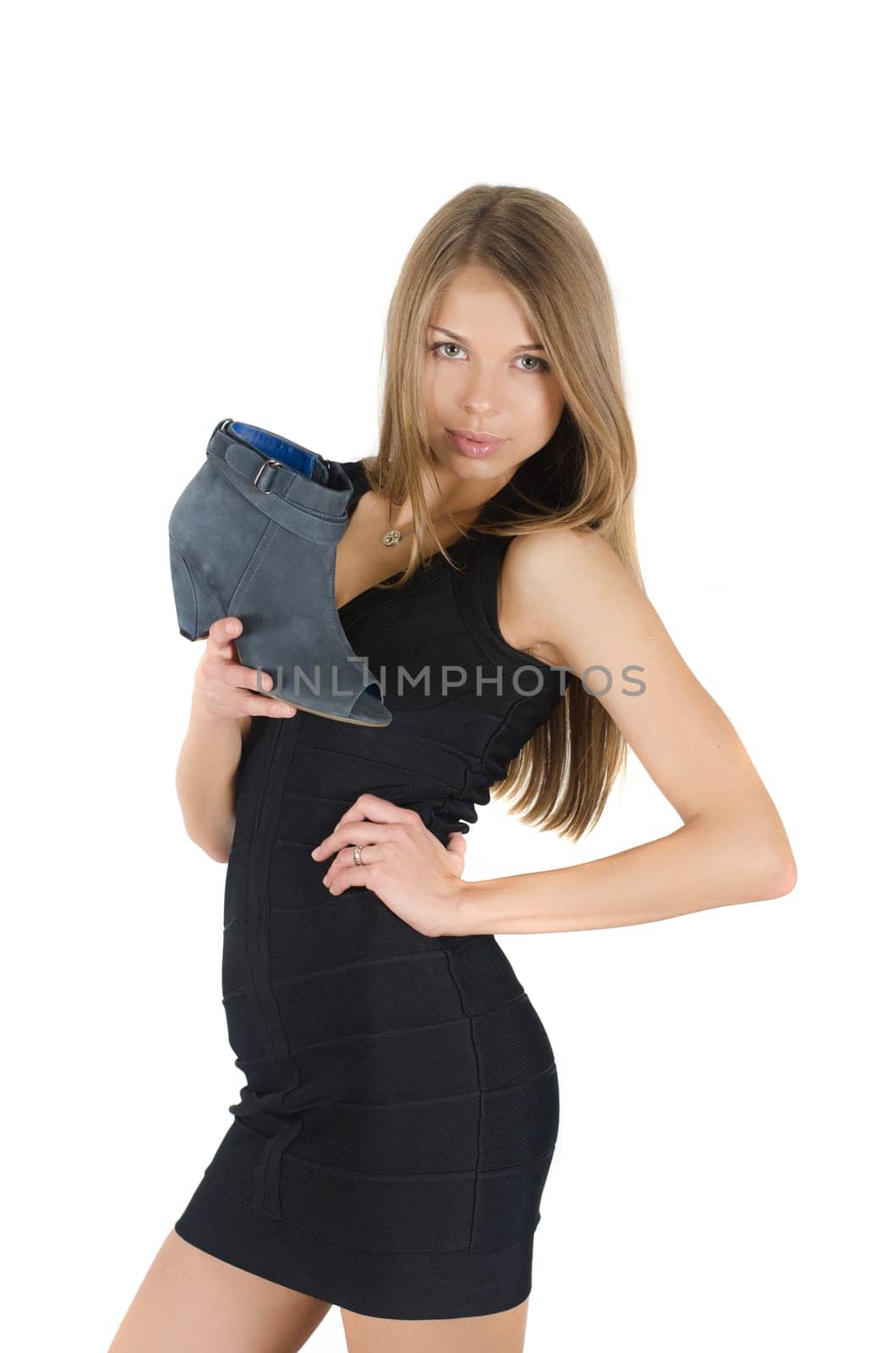beautiful young woman with a shoe on white