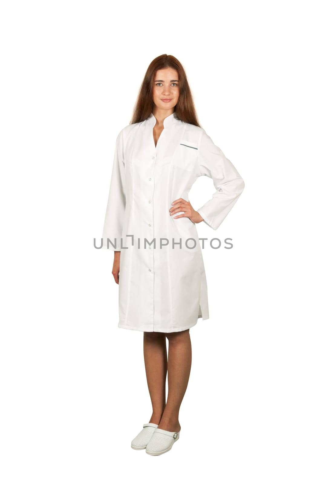 Young female doctor or nurse isolated on white
