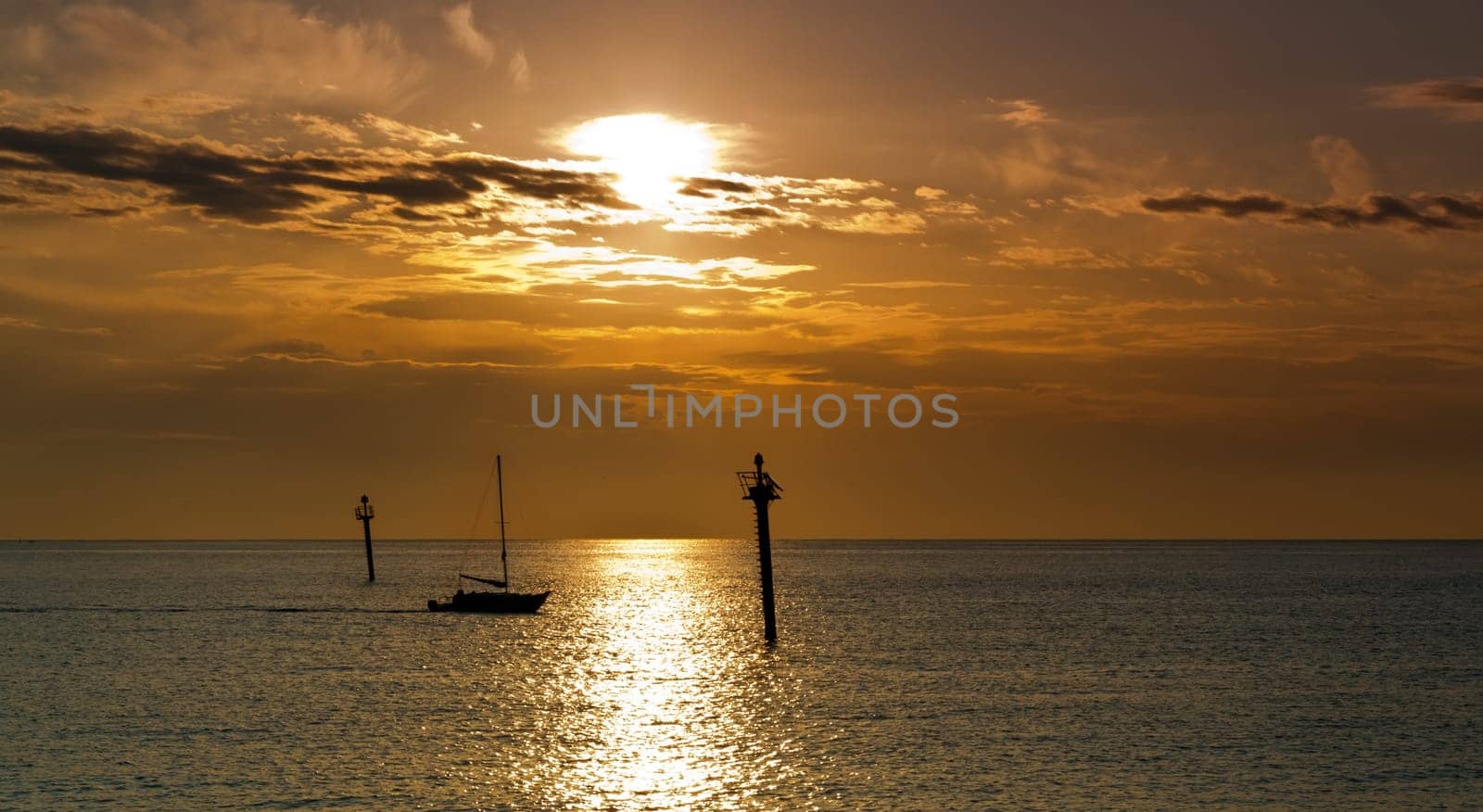 Sailboat at dawn, taken from Barcelona on the Mediterranean sea.