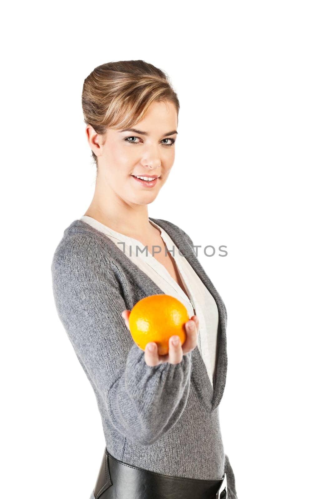 Pretty girl hold an orange in her hand  isolated on white background