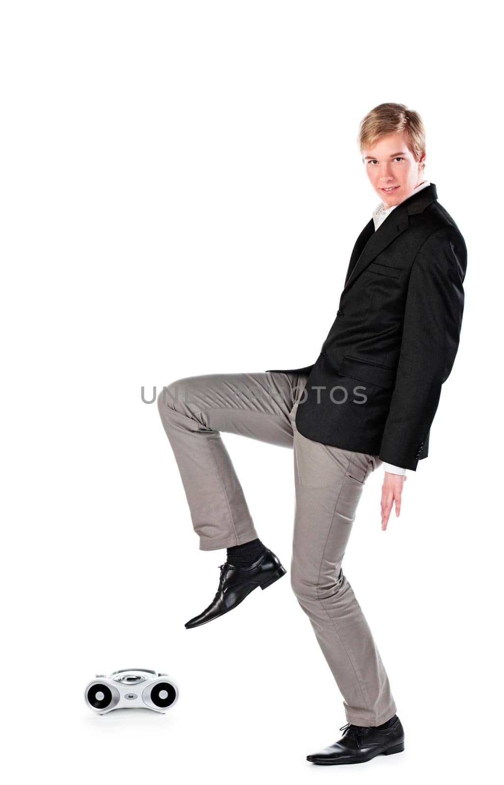 Young blond handsome man with a boombox  isolated on white