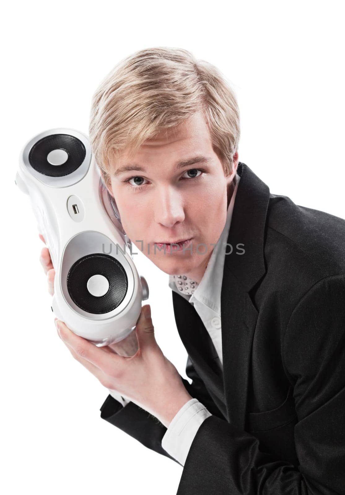 Young blond handsome man holding boombox  isolated on white