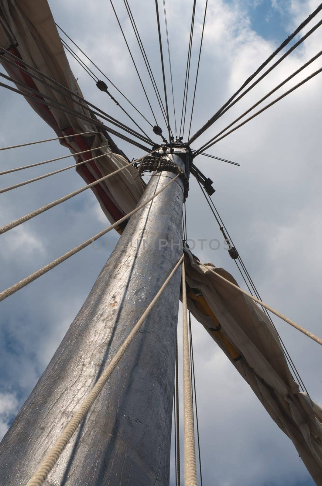 mast and sail of old hanseatic sailing ship