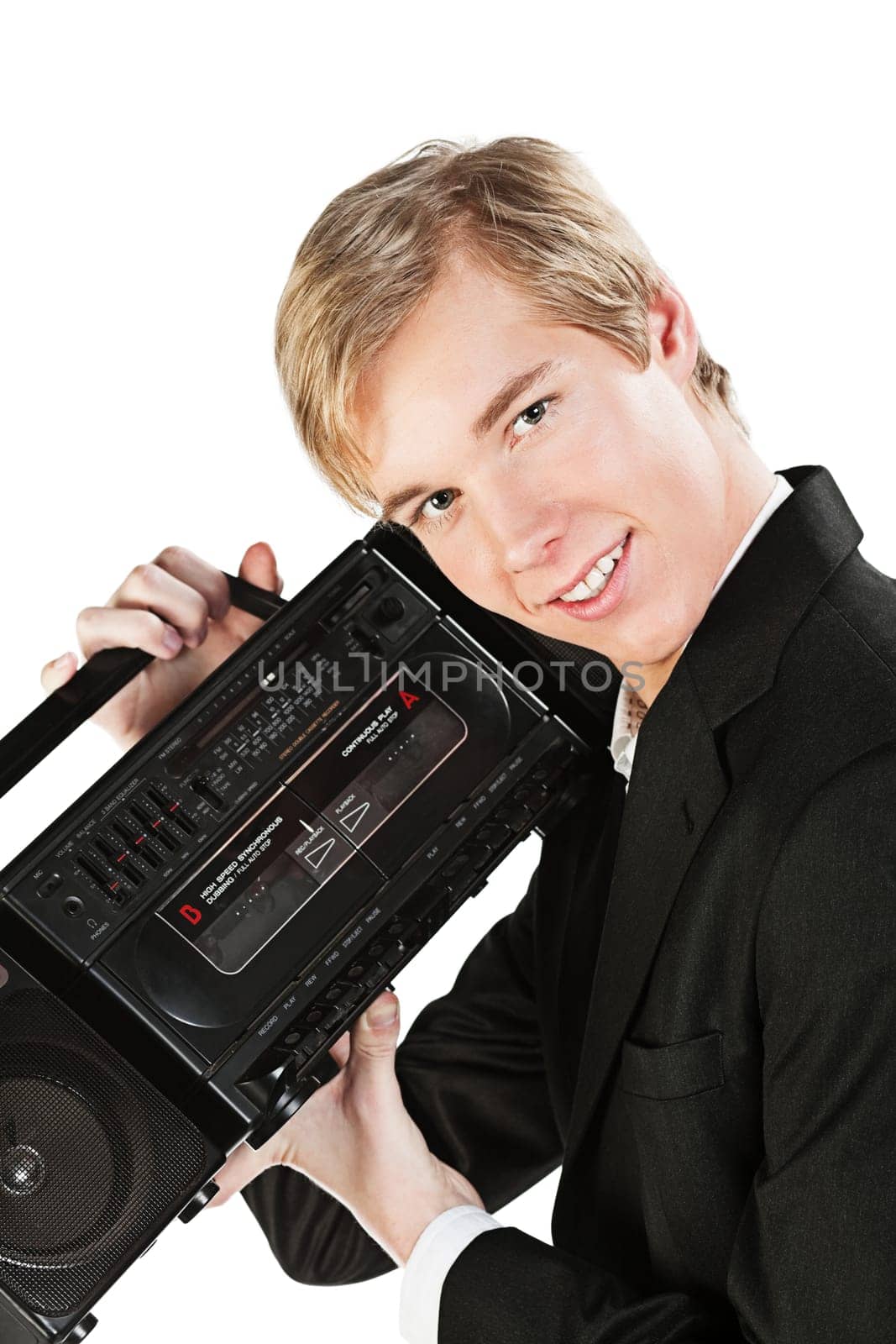 Blond handsome smiling young man holds stereo player in 1980s style
