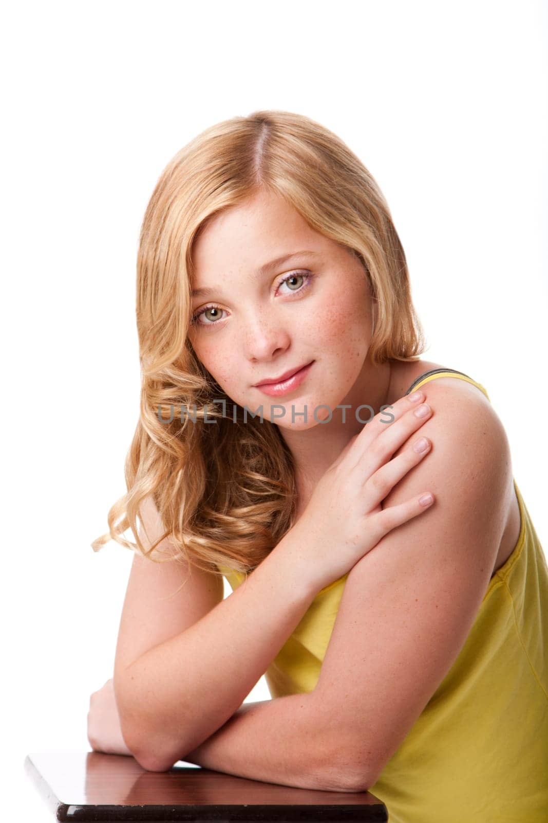 Beautiful teenager girl with clean and healthy facial skin and freckles, isolated.