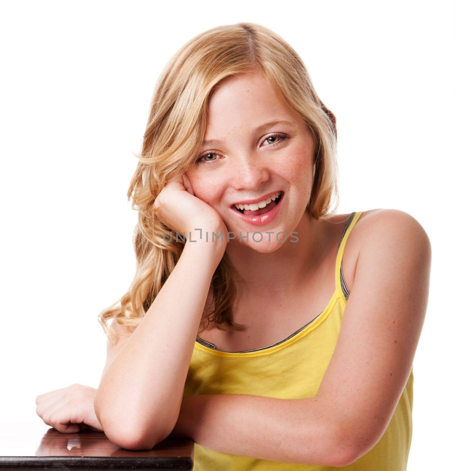 Happy laughing teenager girl with clean facial skin and freckles, isolated.