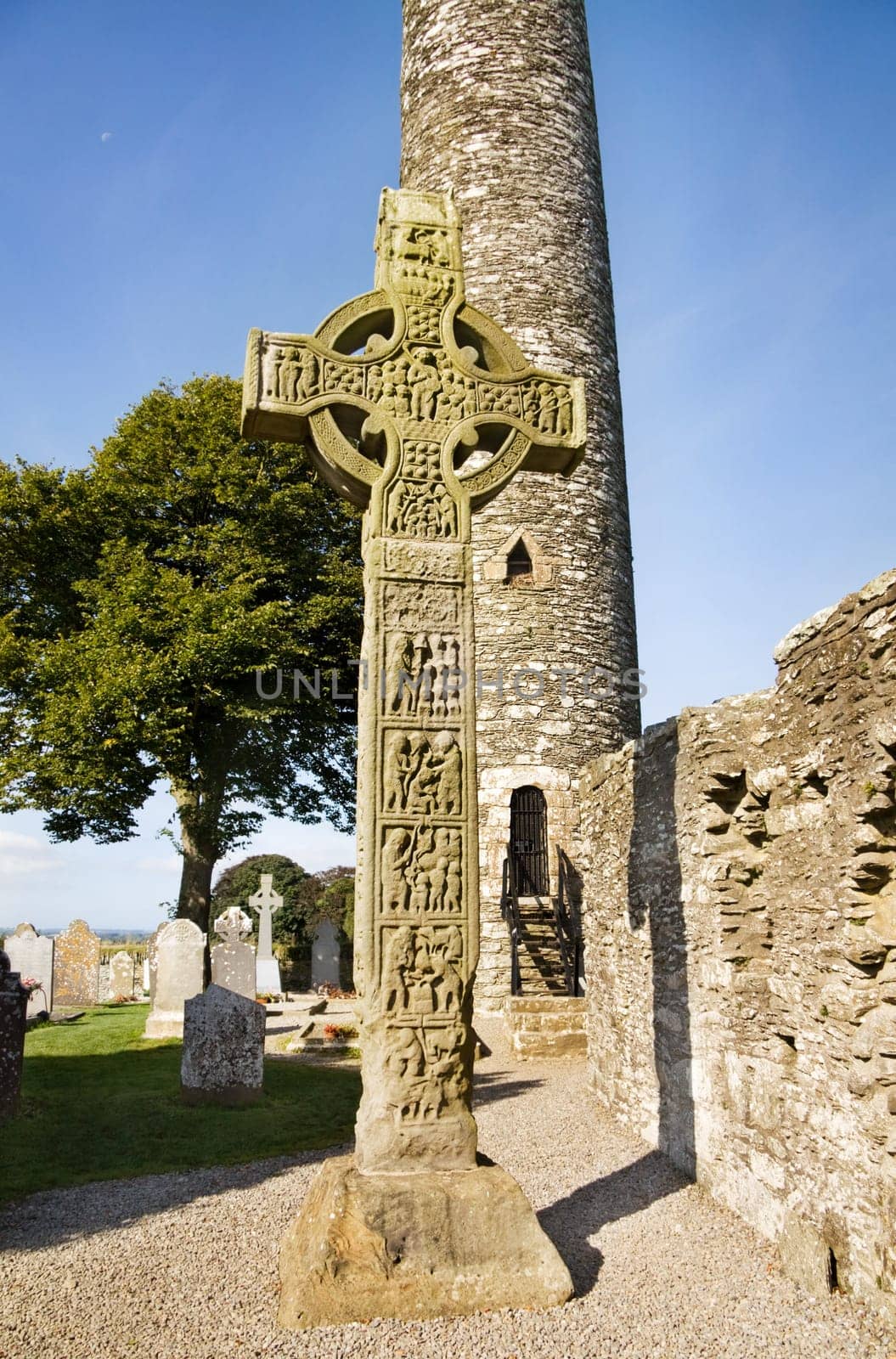 The Tall Cross (or the West Cross) at Monasterboice was built around the 9th century. At almost 7 meters high this is the tallest High Celtic Cross in Ireland. It is richly engraved with religious iconographics and biblical scenes.