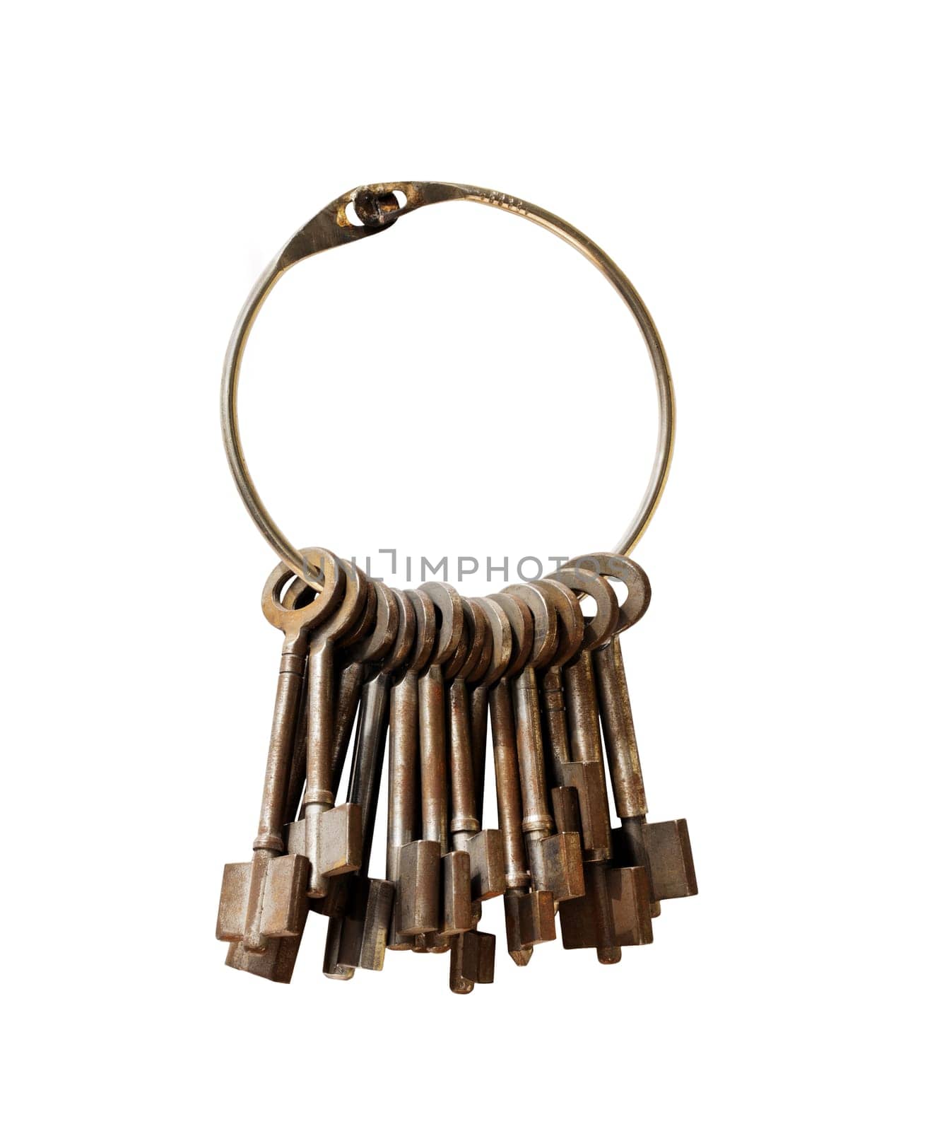 Closeup of bunch of Antique keys on a big keyring.isolated on white with Clipping Path