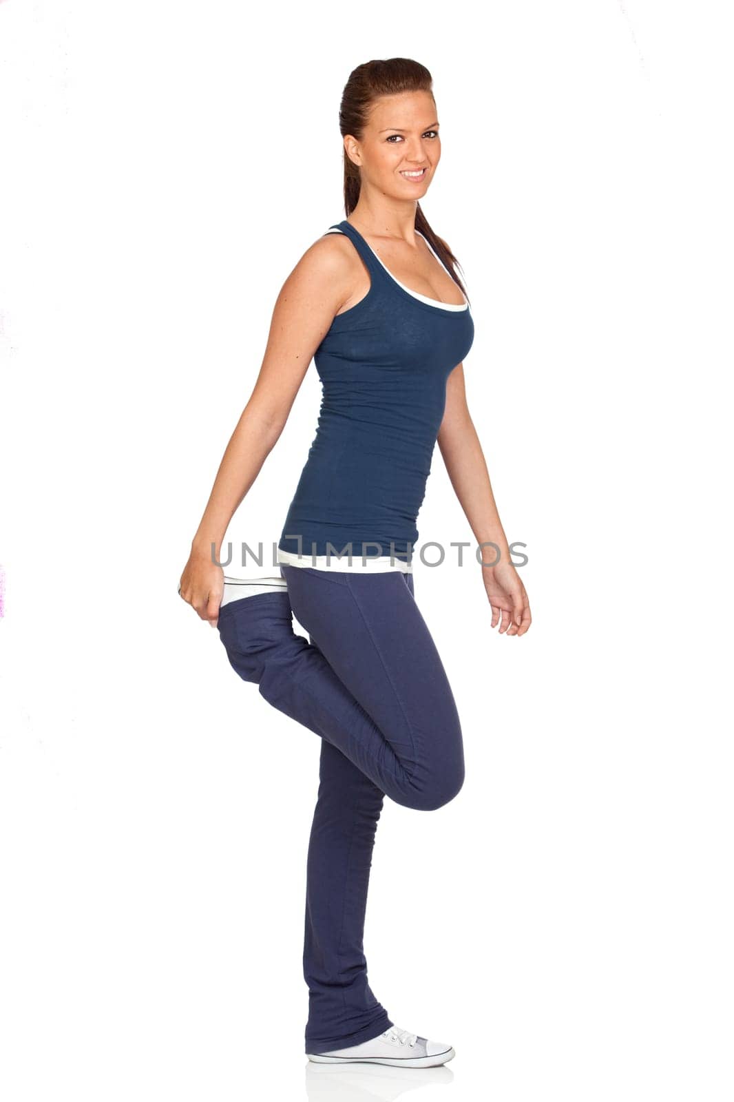 Attractive girl stretching isolated on white background