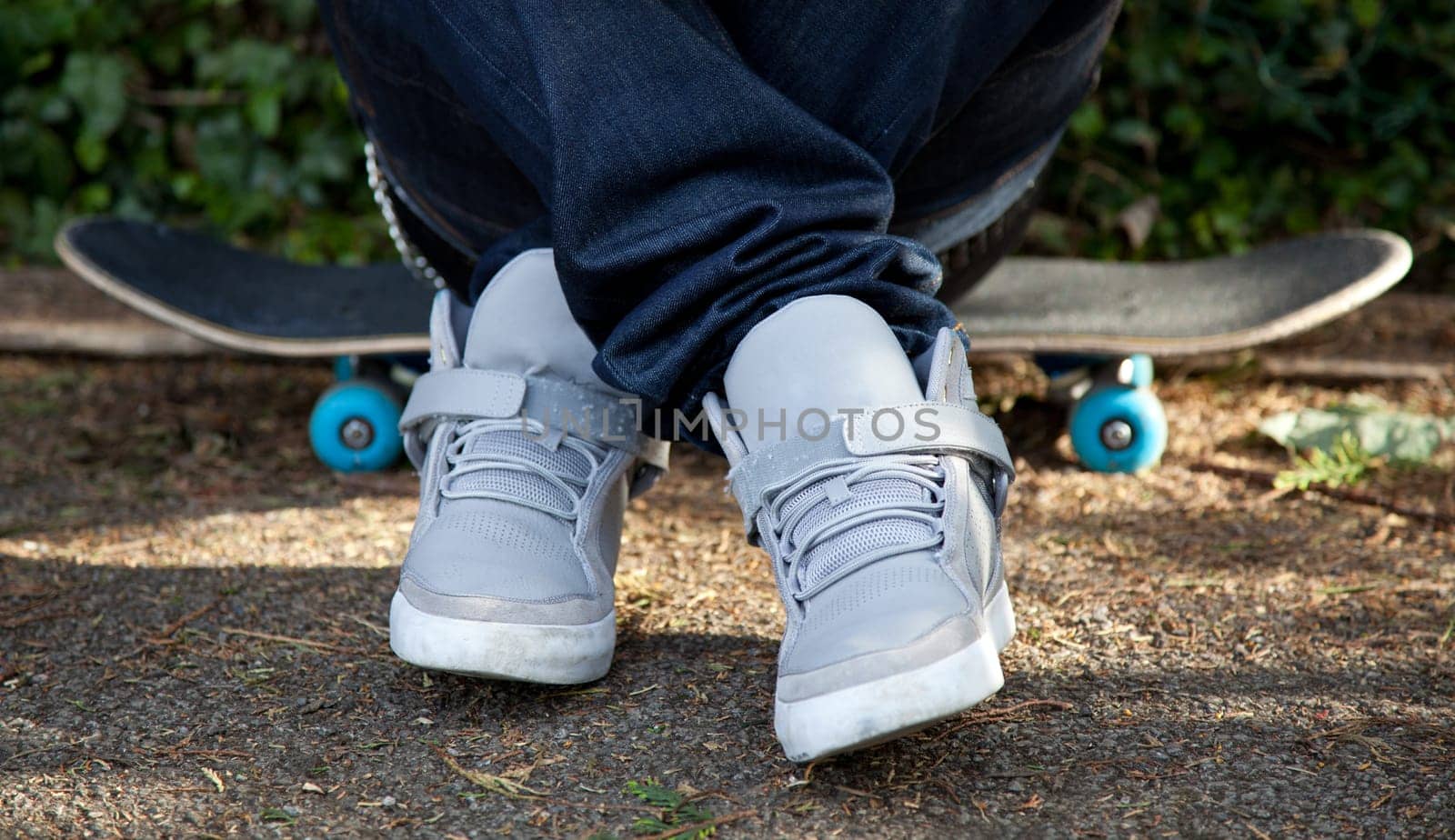 Man sitting on his skateboard