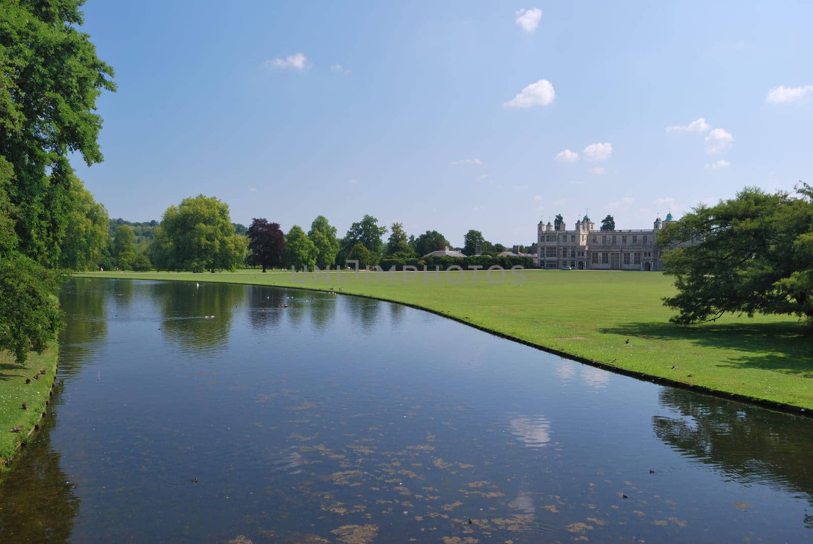 stately home with water in foreground