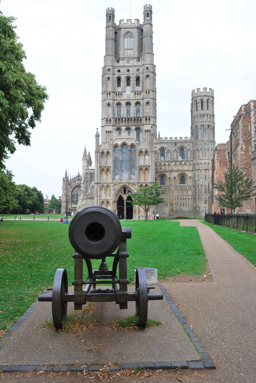 View of Ely Cathedral with Canon in foreground
