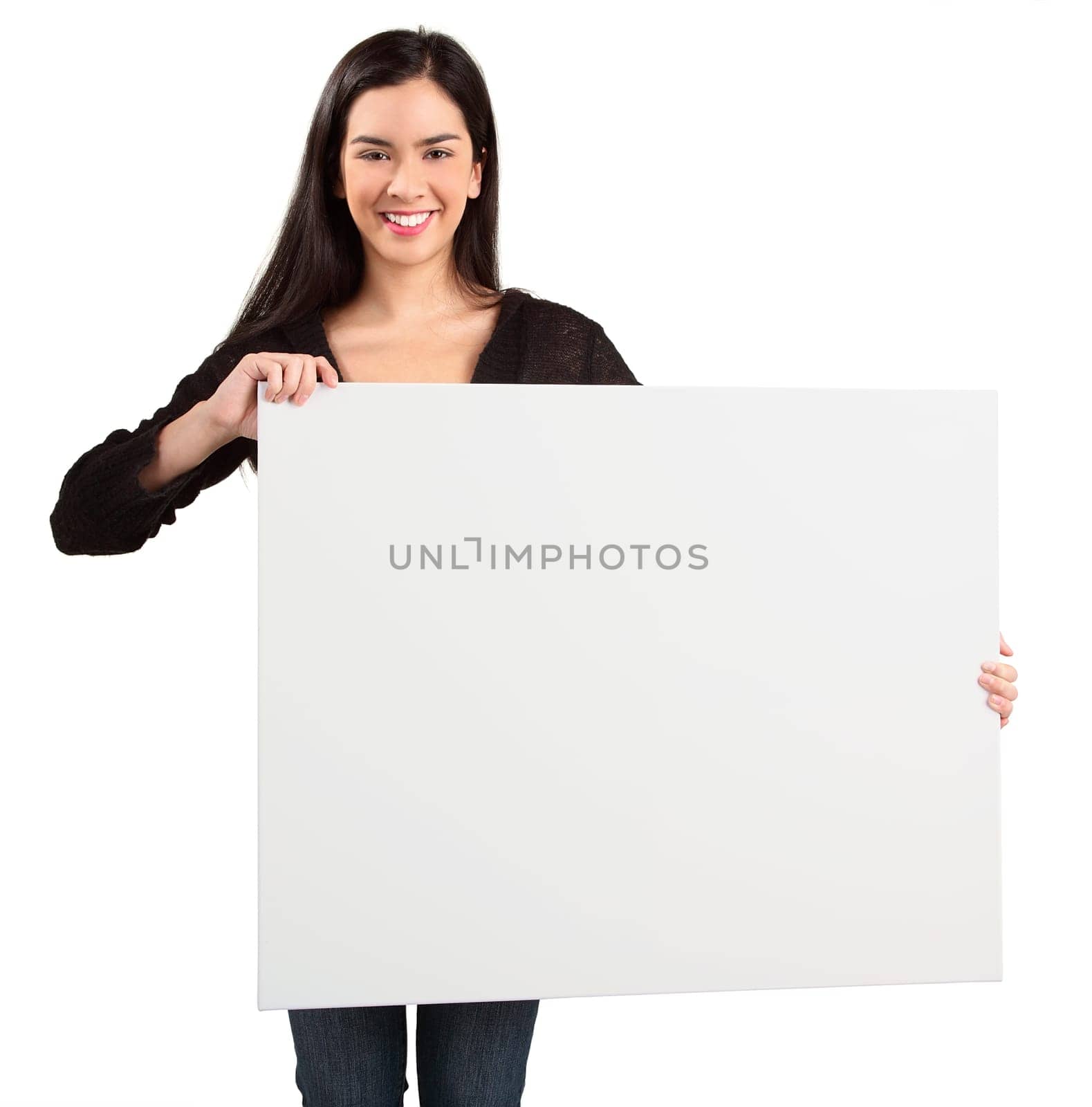 A beautiful young woman is holding a blank white sign.