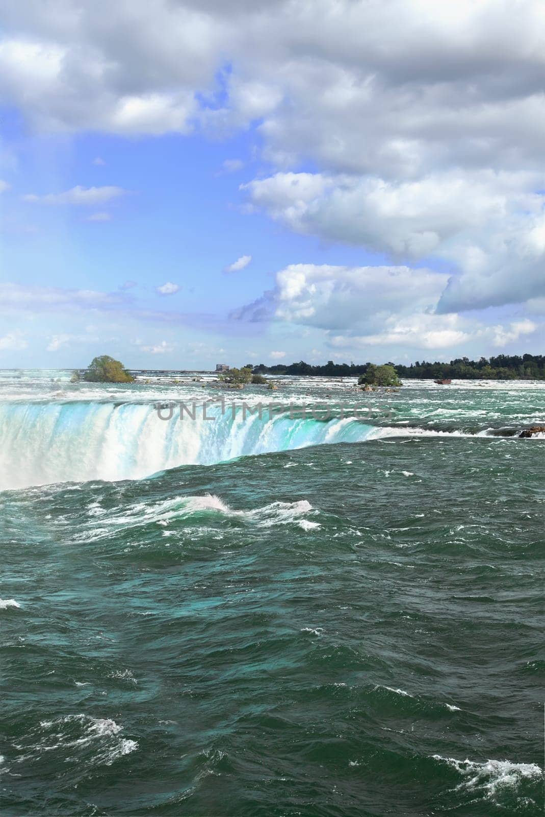 This is a view of the horseshoe falls in Niagara Falls, Ontario, Canada.