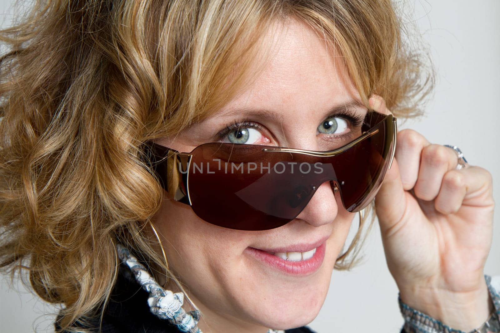blonde girl with sunglasses