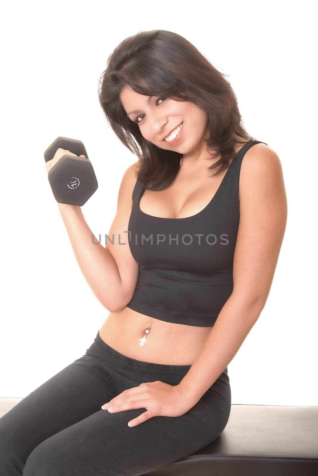 Beautiful young latina girl doing a fitness workout