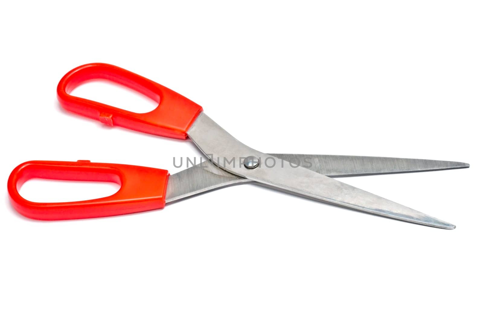 Red handled scissors isolated on white background