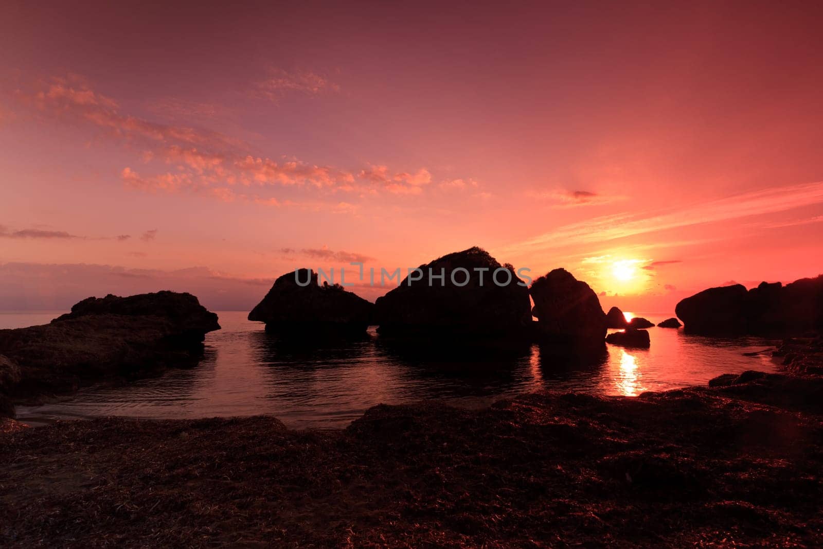 a beautiful sunrise on the beach Porto Zoro, Zakynthos, Greece