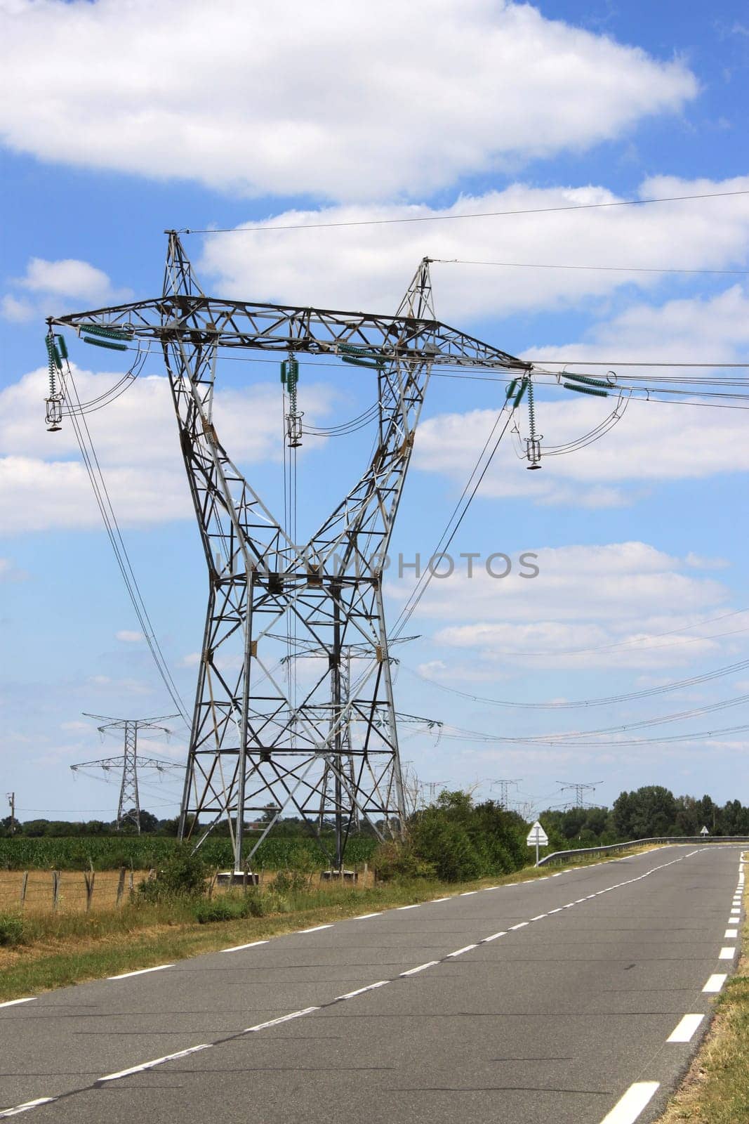 a tower to a power near a road