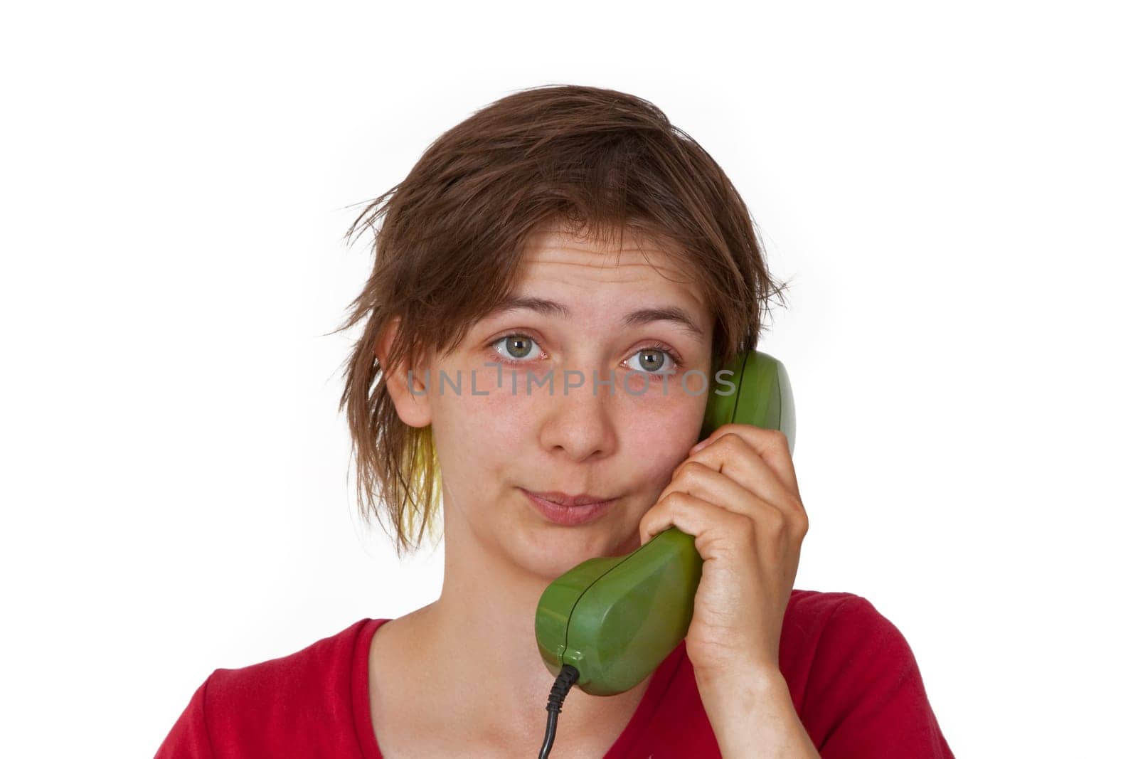 Young woman talking on the phone - isolated on white background