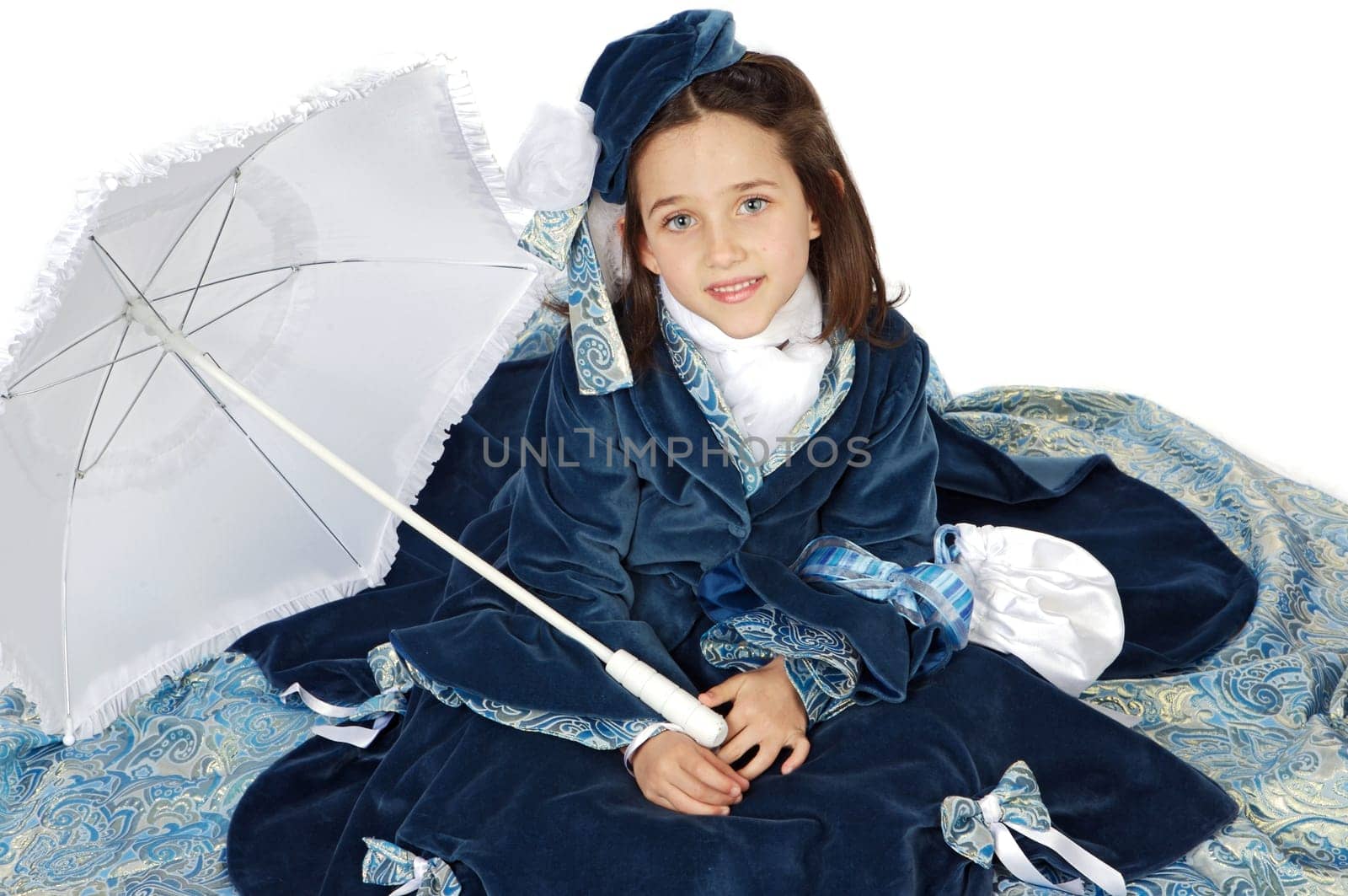 Cute girl with antique clothes over white background