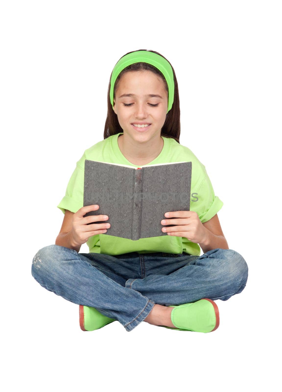 Adorable little girl reading a book isolated on white background